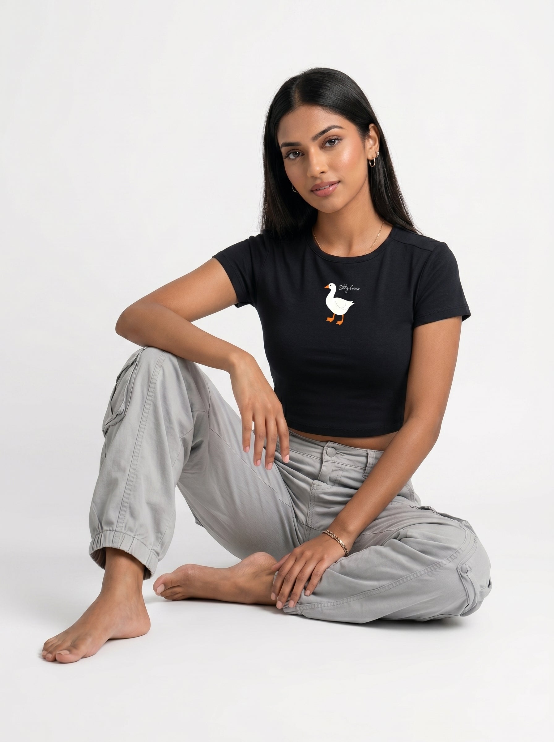 black_model_sitting_floor